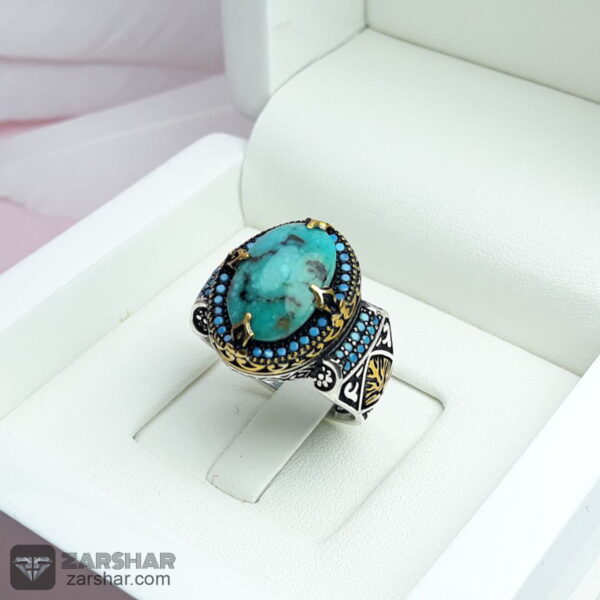 انگشتر فیروزه نیشابوری احیاء شده با رکاب ماشینی اسپرت عکس انگشتر فیروزه نیشابوری احیاء شده با رکاب ماشینی اسپرت