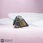 عکس انگشتر فیروزه نیشابوری احیاء شده و برنج کاری شده