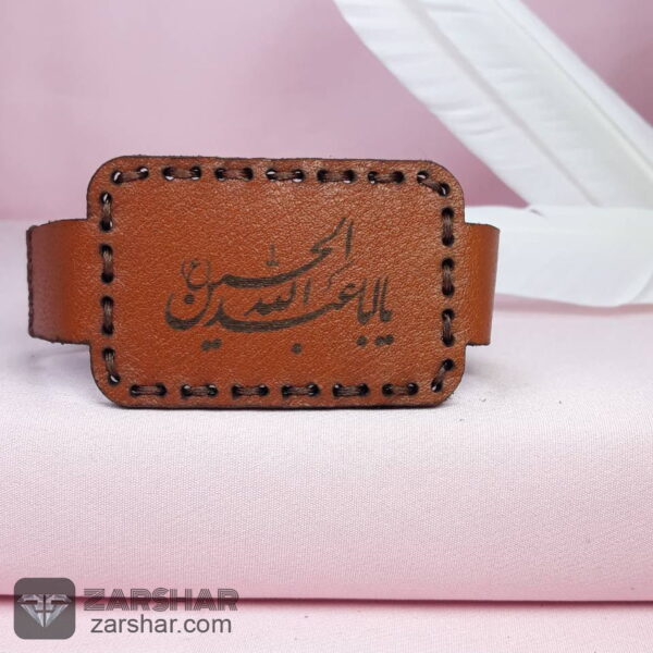 عکس انواع بازوبند چرمی طبیعی و حرز کبیر امام جواد روی پوست آهو با رعایت آداب