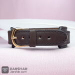 عکس دستبند چرمی عقیق قرمز وان یکاد قاب نقره دست‌ساز