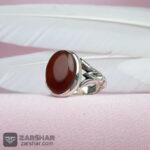 عکس انگشتر عقیق یمنی سرخ با حرز امام جواد و تربت امام حسین