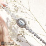 عکس ساعت نقره زنانه بیضی طرح شکوفه