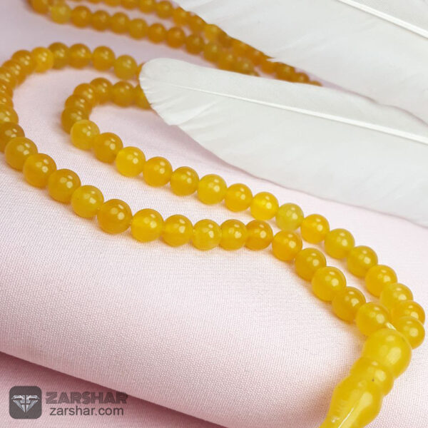 تسبیح جید زرد شرف الشمس 101 دانه، دانه ریز عکس تسبیح جید زرد شرف الشمس 101 دانه، دانه ریز