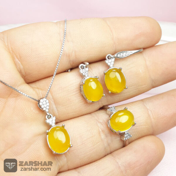 نیم ست نقره عقیق زرد شرف الشمس طرح بیتا زنانه عکس نیم ست نقره عقیق زرد شرف الشمس طرح بیتا زنانه