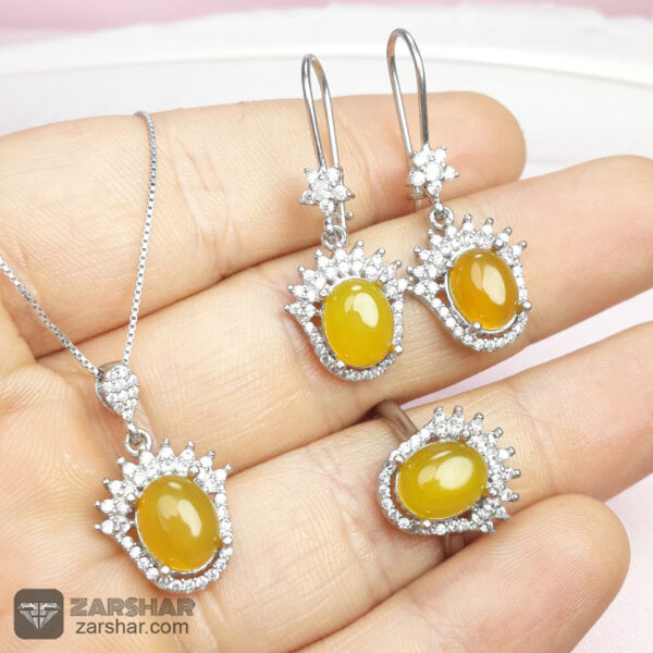 نیم ست نقره عقیق زرد شرف الشمس طرح تیبا زنانه عکس نیم ست نقره عقیق زرد شرف الشمس طرح تیبا زنانه