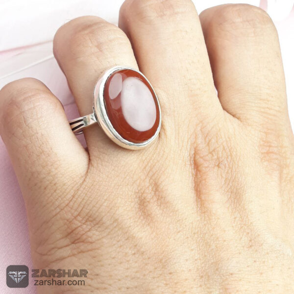 عکس انگشتر عقیق یمنی سرخ همراه حرز امام جواد(ع) و تربت