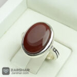 عکس انگشتر عقیق یمنی سرخ همراه حرز امام جواد(ع) و تربت