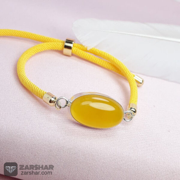 دستبند بافت دار زنانه عقیق زرد شرف الشمس عکس دستبند بافت دار زنانه عقیق زرد شرف الشمس